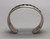 sterling silver overlay bracelet by Hopi artist, Bernard Dawahoya, geometric overlay design, tippling technique, darkened silver background