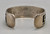 sterling silver overlay bracelet by Hopi artist, Bernard Dawahoya, geometric overlay design, tippling technique, darkened silver background