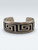 Sterling silver overlay bracelet by Hopi artist, Bernard Dawahoya, geometric overlay design, tippling technique, darkened silver background