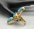 gold, diamond, and spiderweb turquoise ring by Elias, spiderweb turquoise cabochons on a 14K yellow gold band