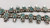 vintage 1950-1960s squash blossom necklace, cluster of petit point and snake-eye turquoise cabochons, silver beads, foxtail wire