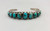 1920-1930s turquoise row bracelet, graduated turquoise cabochons in handmade sawtooth bezels, silver dot accents