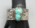 unique style bracelet with great stone by Curtis Pete, turquoise cabochon, fancy bezel, sterling silver