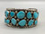 14-stone webbed turquoise bracelet, 14 incredible webbed turquoise cabochons in handmade sawtooth bezel, heavily detailed silverwork