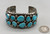 14-stone webbed turquoise bracelet, 14 incredible webbed turquoise cabochons in handmade sawtooth bezel, heavily detailed silverwork