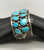 14-stone webbed turquoise bracelet, 14 incredible webbed turquoise cabochons in handmade sawtooth bezel, heavily detailed silverwork