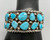 14-stone webbed turquoise bracelet, 14 incredible webbed turquoise cabochons in handmade sawtooth bezel, heavily detailed silverwork