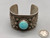 hefty turquoise and sterling silver bracelet, turquoise cabochon in a sawtooth bezel, twisted wire and silver applique