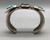 vintage hefty three-stone turquoise bracelet, handmade sawtooth bezels with twisted wire and silver dot accents, hand stamped designs