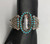 satellite bracelet with petrified wood and turquoise, handmade sawtooth bezel, with snake-eye turquoise cabochons, sterling silver