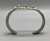 1930s-1940s three-stone handmade bracelet, three turquoise cabochons with intricate loops of silver in between and silver dots