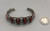 vintage six-stone coral bracelet, six coral cabochons, handmade sawtooth bezels, three wire terminal