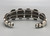 vintage six-stone coral bracelet, six coral cabochons, handmade sawtooth bezels, three wire terminal