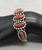vintage six-stone coral bracelet, six coral cabochons, handmade sawtooth bezels, three wire terminal