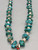 chunky turquoise and heishi necklace with jocla's, chunky turquoise pieces of various shapes, sizes, and shades, as well as larger heishi beads