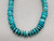 disc bead style turquoise necklace, filled with beautiful turquoise disc beads with small turquoise beads in between the lower portion