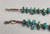 vintage turquoise nugget and fine heishi necklace, strung on a wax cord, conjoined by silver findings