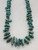 vintage turquoise nugget and fine heishi necklace, strung on a wax cord, conjoined by silver findings