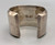 massive channel inlay bracelet by Ervin Tsosie, heavy sterling silver band