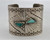 wide sterling silver and turquoise bracelet, two triangular turquoise cabochons