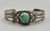 1930s-1940s era sterling silver and turquoise bracelet, round green turquoise cabochon