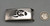 1960s era bear paw design overlay belt buckle by Hopi artist, Nathan Fred JR., darkened silver background, sterling silver