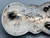 vintage seven-stone ingot belt buckle, handmade bezels, darkened silver background, hand hammered ingot, applique