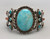 vintage handmade ingot bracelet with inlay, larger turquoise cabochon, mother of pearl and coral inlay on either side, butterfly design