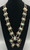unique style, eye-catching naja, with five turquoise cabochons on individual silver plates, 12 blossoms/pendants along the neck