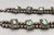 unique style, eye-catching naja, with five turquoise cabochons on individual silver plates, 12 blossoms/pendants along the neck