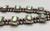 unique style, eye-catching naja, with five turquoise cabochons on individual silver plates, 12 blossoms/pendants along the neck