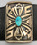 thick silver plate with a single gorgeous turquoise cabochon, lovely geometric overlay with a stippled, darkened background