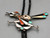 vintage road runner theme inlay bolo tie, shell, coral, turquoise, onyx, and mother of pearl inlay