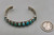 eleven natural turquoise cabochons in a row