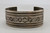 1940's, wonderful hand stamped designs with deep, silver lines throughout