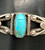 central turquoise cabochon, much wonderful hand made twisted wire