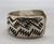 zig-zag pattern overlay, wider sterling silver band