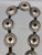 10 conchos,  detailed file work, hand stamped designs and repousse silver work