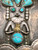 shadowbox kachina themed belt buckle, six turquoise cabochons