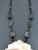 statement piece turquoise coral kachina themed necklace