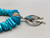 turquoise and sterling silver naja necklace by Kindale Billah
