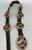 mudhead themed coral inlay, bracelet, five-pendant necklace, ring, and six-piece concho belt