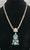 sterling silver and turquoise necklace by Jefferson Abeyta, gorgeous modern pendant, eight turquoise cabochons