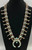 set with older webbed #8 turquoise, classic naja holds 15 gorgeous turquoise cabochons, 18 beautiful three petal blossoms