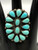 nine beautiful teardrop-shaped turquoise cabochons