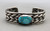 single turquoise cabochon, two bands of twisted wire