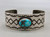1940s-1950s, nice turquoise cabochon in the center, hand stamping