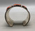 three coral cabochons in varying sizes, good weighted feel