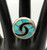 flush, turquoise channel inlay, geometric design on a ring, bracelet, and pendant