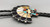 mother of pearl, coral, turquoise, and onyx inlay, Sunface design